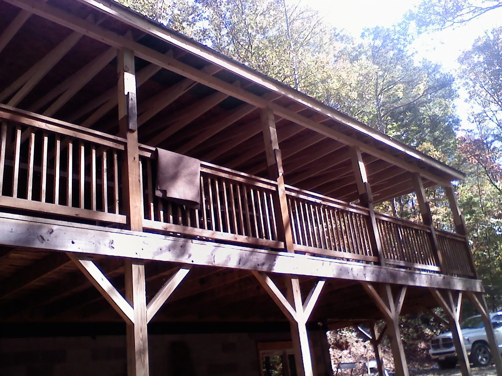 Timber framing under a new elevated porch and deck — Roof Leak Repair in Phillips by Roofing Brothers